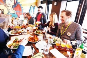 people eating a meal at a table