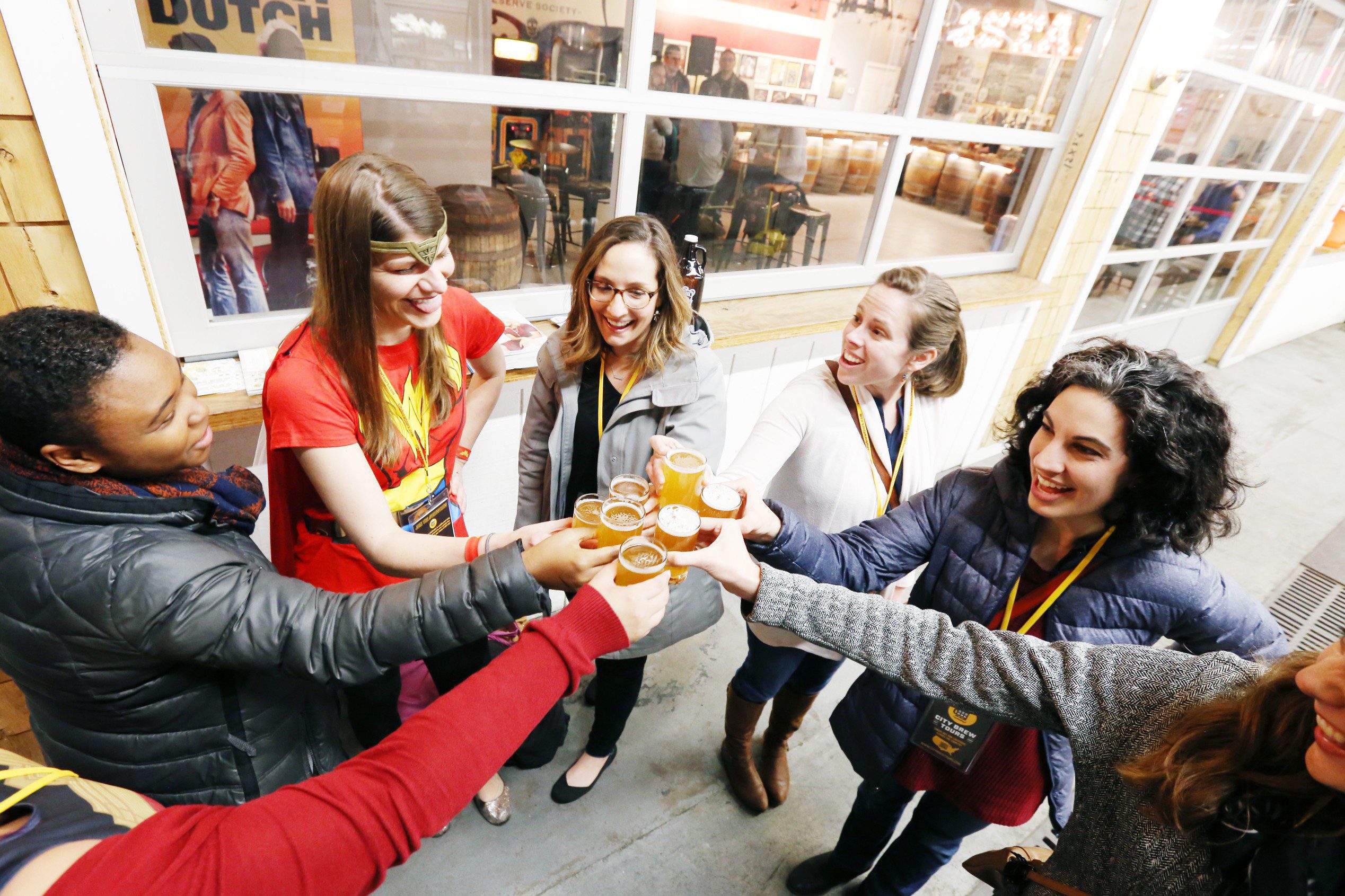Bachelorette Party with City Brew Tours DC toasts with beers