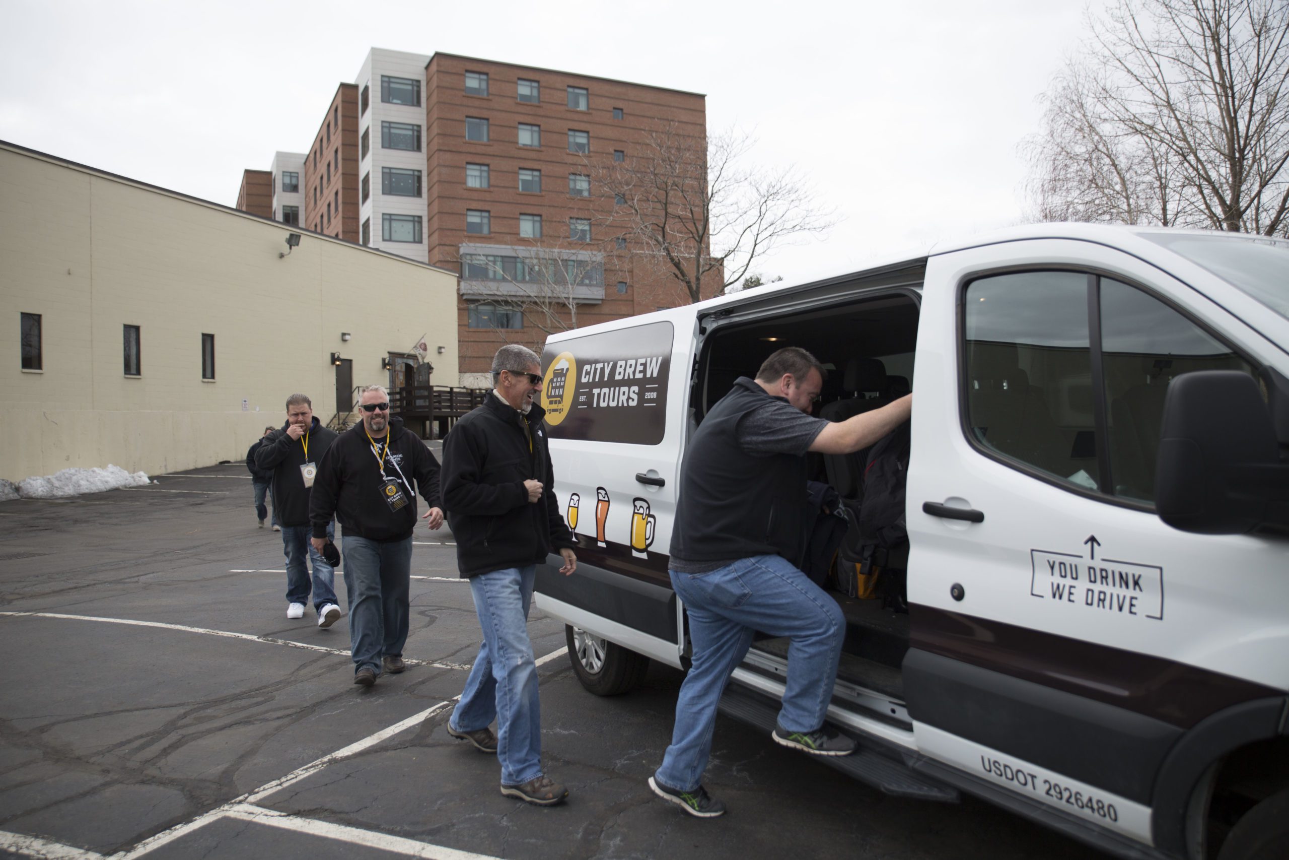 Guests board the City Brew Tours van