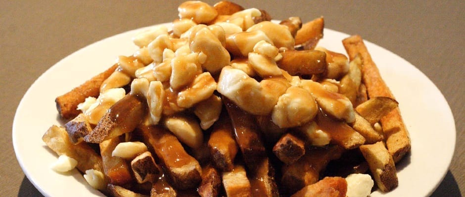 Poutine is one of the things to know before traveling to Montreal