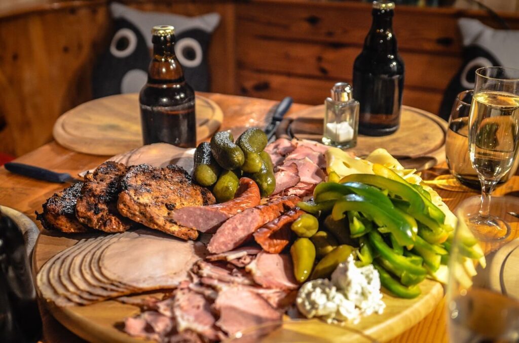 a beer and food pairing with ham and chili pepper