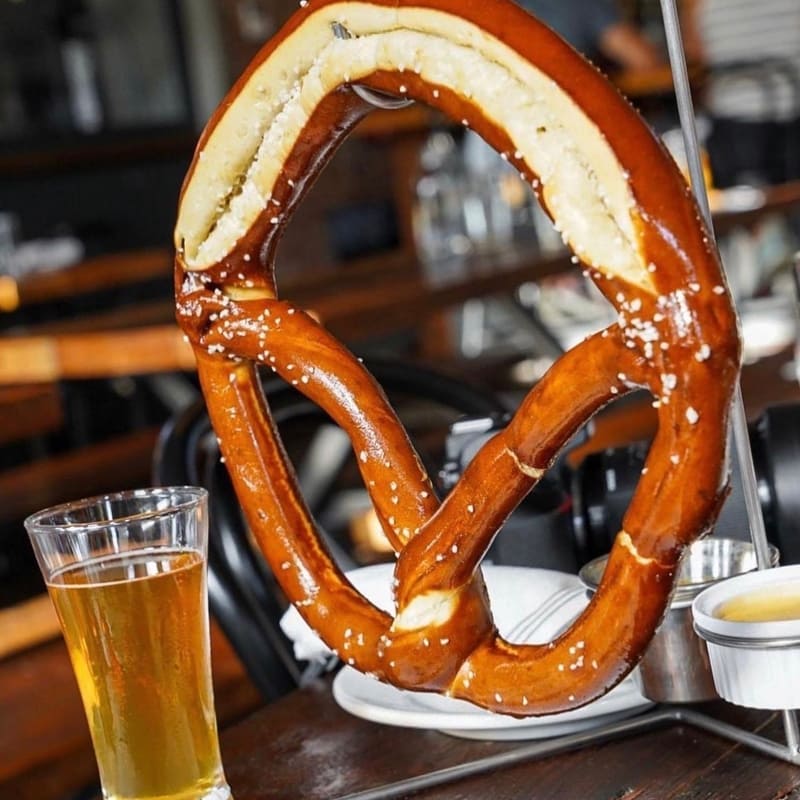 Large soft baked pretzel and a pint of beer